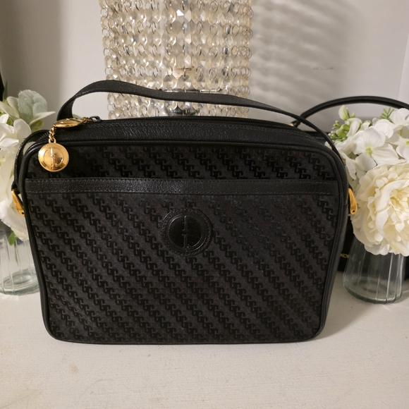 Gucci Handbags - Gucci Black Textured Crossbody Bag with Gold Details